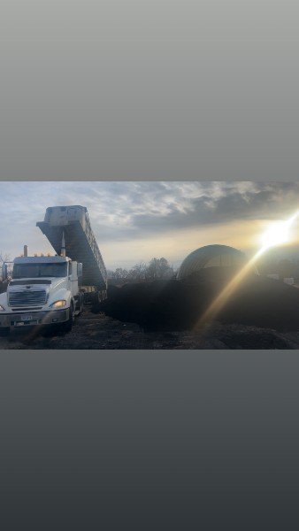 Dumping a load at sunset